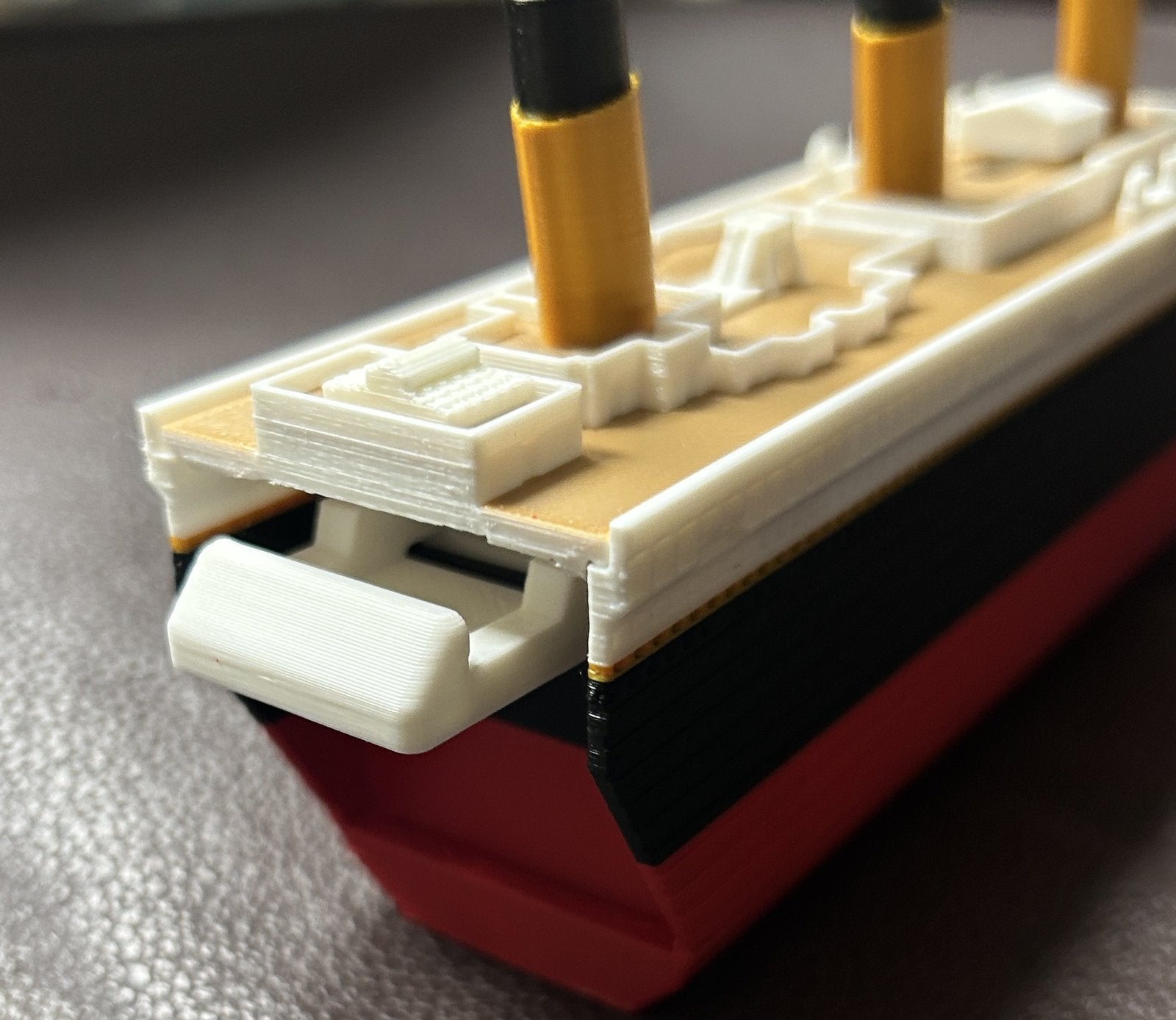 The latch inside the hull that holds the bow and stern together