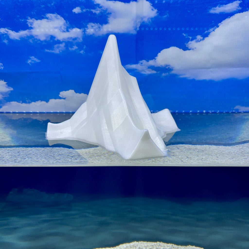 BigBerg jumbo glow-in-the-dark iceberg floating in water against a blue sky