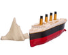 Submersible Titanic model with its bow against the iceberg, at the moment of collision