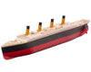 16-inch sinkable Titanic model ship with black and red hull and four gold funnels, side view