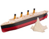 Submersible Titanic model ship with its glow-in-the-dark iceberg alongside
